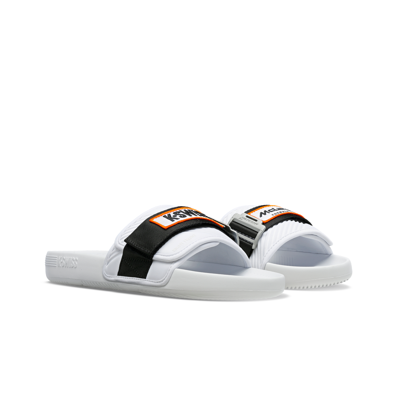 McLaren x K-Swiss white strap sandals with black and orange McLaren straps – front angled pair view