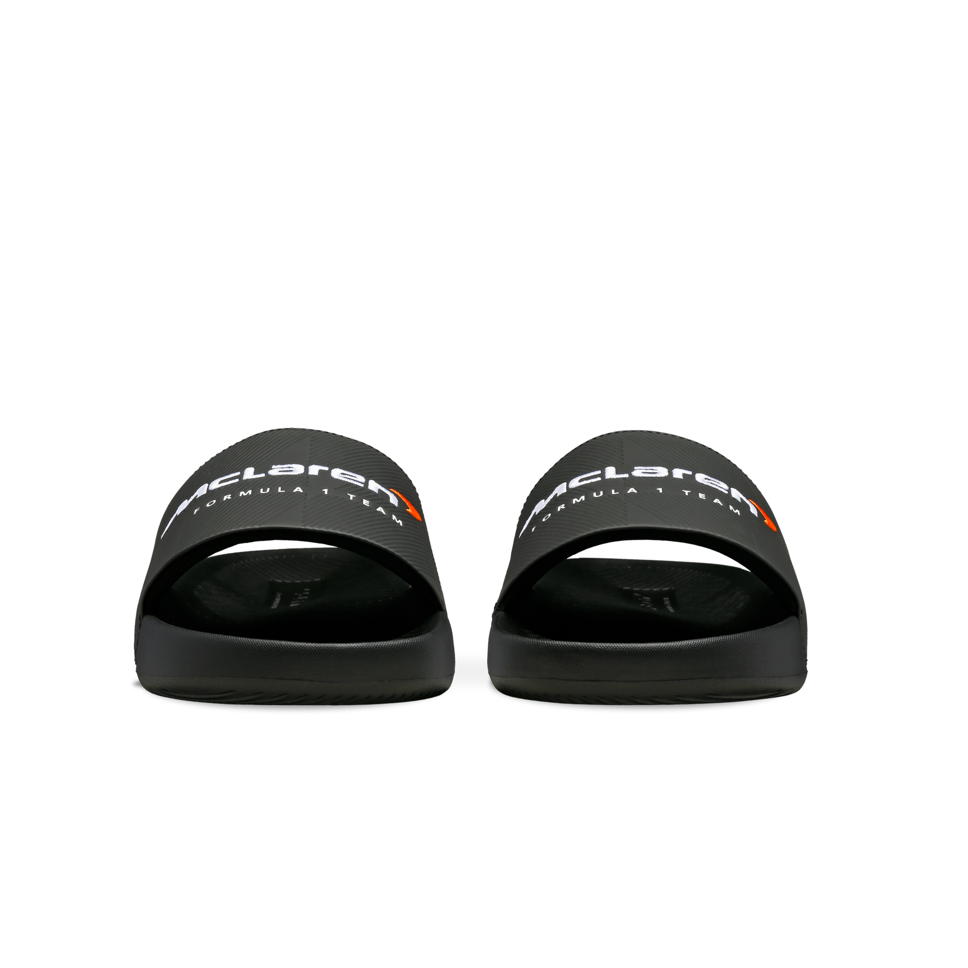 McLaren x K-Swiss black slide sandals with McLaren Formula 1 branding – front view of pair