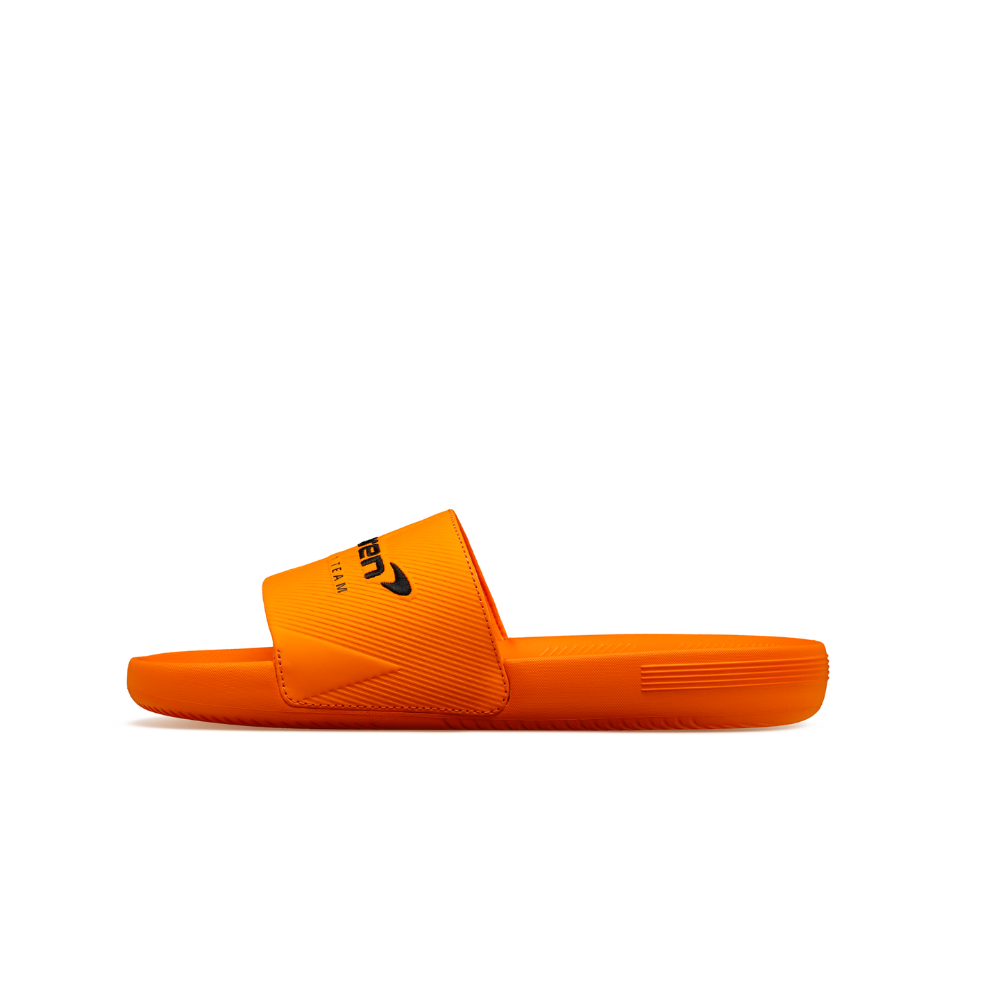 McLaren x K-Swiss papaya orange slide sandal with McLaren logo strap detail – inner side profile view